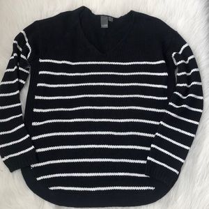 Navy/white striped sweater.